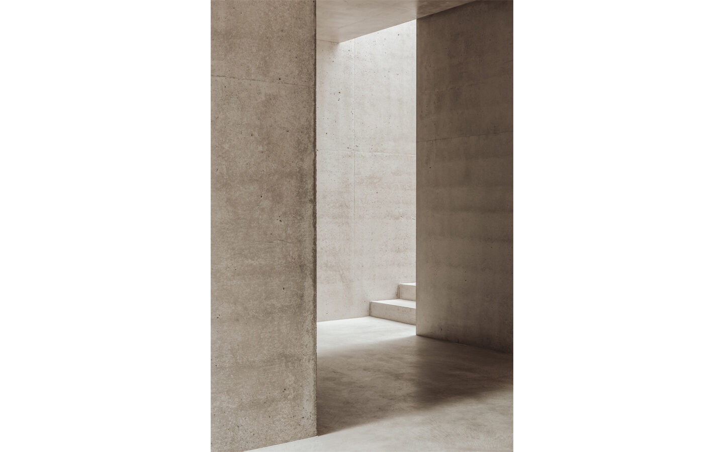 Minimalist concrete interior with natural lighting