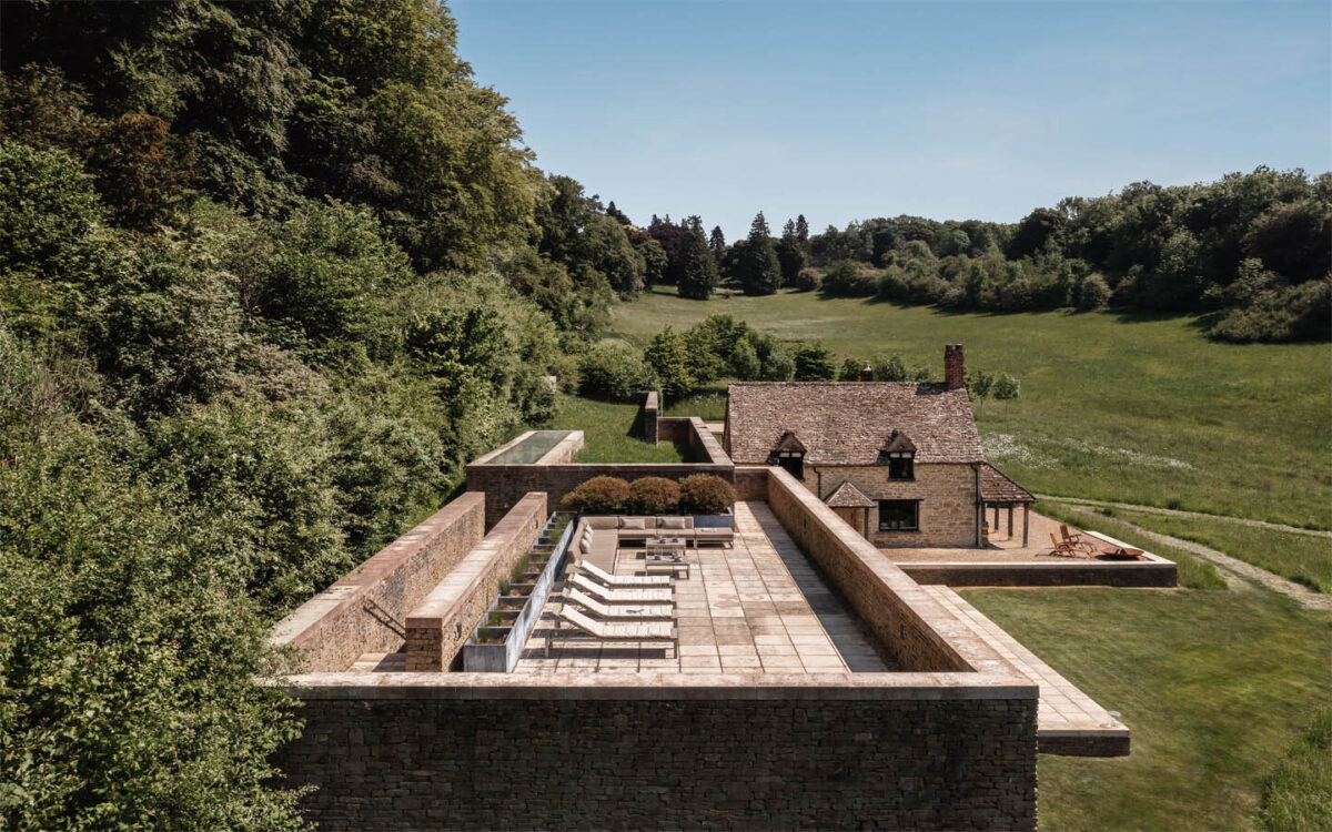 Rustic villa with patio and scenic countryside view.
