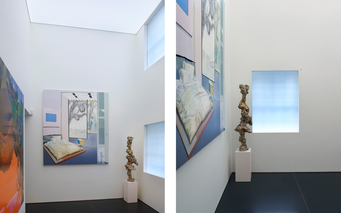 Modern art exhibit with abstract painting, sculpture.