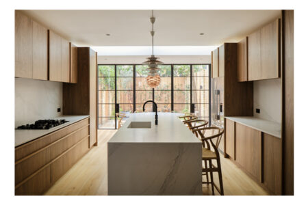 Modern kitchen with wooden cabinets and island