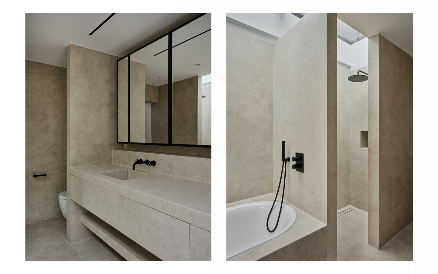 Modern bathroom with stone walls and black fixtures.